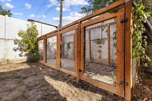 Gate with exterior structure and an outdoor structure
