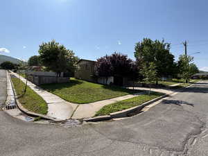 View of property hidden behind natural elements