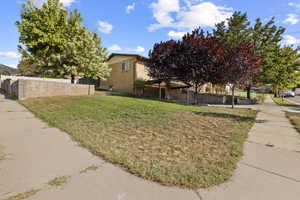 View of side of property with brick siding