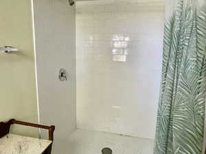 Bathroom with tiled shower