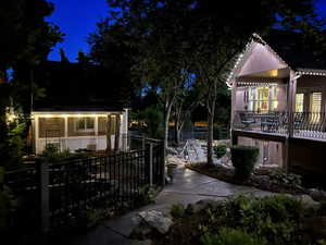 View of backyard with shed / garden area / back covered porch