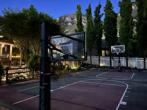 View of sport court with a mountain view