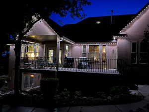 Back of house at night featuring jelly fish lighting