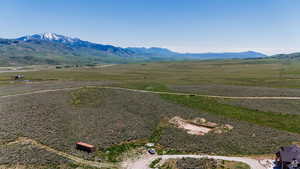Property view of mountains with a rural view