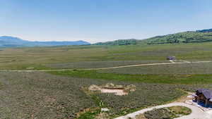 Property view of mountains featuring a rural view