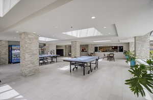 Recreation room featuring recessed lighting and ornate columns