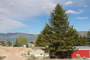 Mountain view featuring a water view