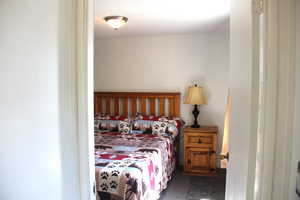 Bedroom with wood finished floors