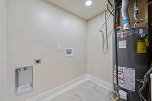Utility room with gas water heater