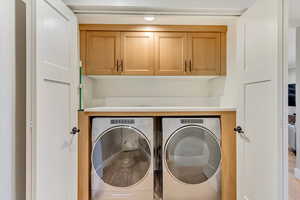 Laundry Closet with storage and countertop in downstairs In-law suite.