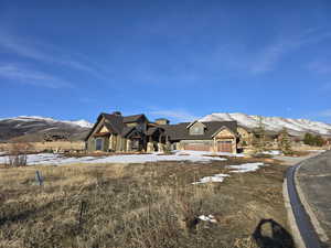 View of front of home with a mountain view