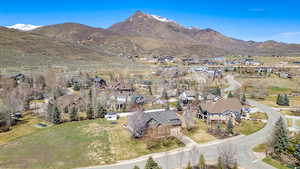 Drone / aerial view with a mountain view and a residential view