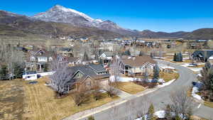 Property view of mountains featuring a residential view