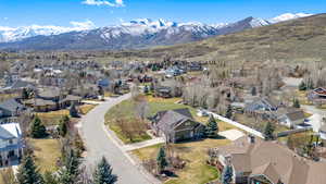 Drone / aerial view with a residential view and a mountain view