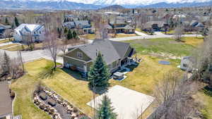 Drone / aerial view with a residential view and a mountain view