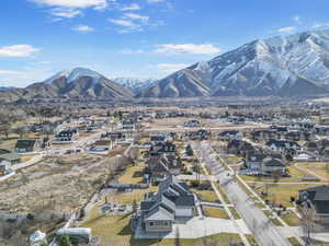 Aerial view featuring a mountain view and a residential view