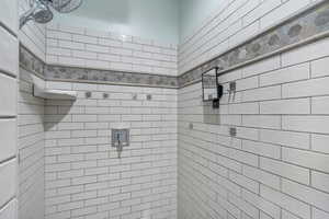 Master Bathroom featuring tiled shower