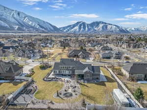 Birds eye view of property featuring a residential view and a mountain view