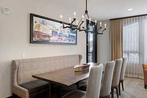 View of carpeted dining room