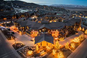 Birds eye view of property featuring a mountain view and a residential view