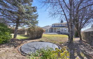 View of yard featuring a porch