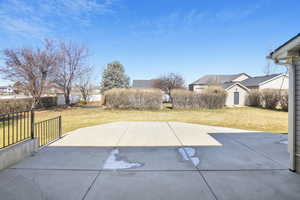 View of patio with fence