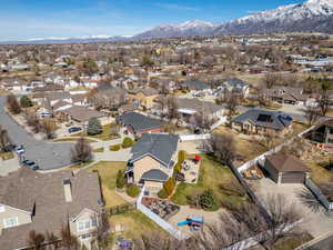 Birds eye view of property featuring a mountain view and a residential view