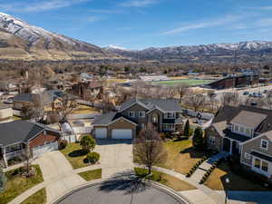 Drone / aerial view featuring a mountain view and a residential view