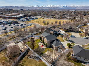 Birds eye view of property featuring a mountain view and a residential view