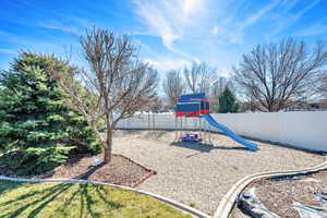 Community jungle gym with fence