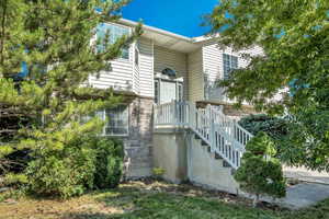 View of front of home featuring brick siding