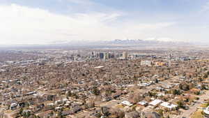 Drone / aerial view featuring a residential view and a mountain view