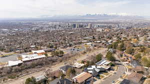 Aerial view featuring a mountain view and a residential view