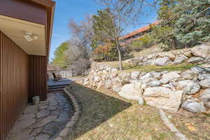 View of yard with fence