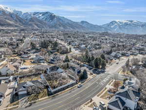 Drone / aerial view featuring a mountain view and a residential view