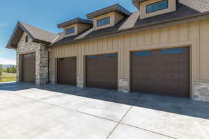 Garage with concrete driveway