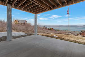 View of patio featuring a water view