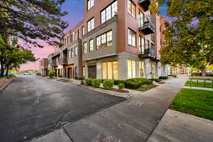 Property at dusk featuring a residential view