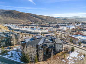 Aerial view featuring a mountain view and a residential view