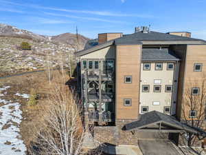 View of property with a mountain view