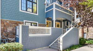 Exterior space featuring stone siding