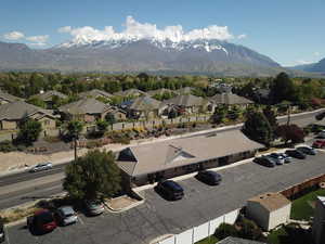 Drone / aerial view featuring a residential view and a mountain view