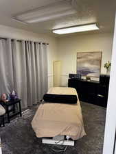Bedroom featuring a textured ceiling