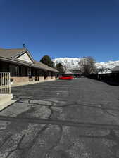View of vehicle parking featuring a mountain view