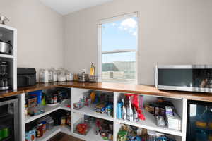 Storage area featuring wine cooler