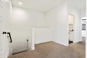Interior space featuring recessed lighting and baseboards