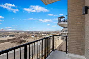 Balcony featuring a valley view