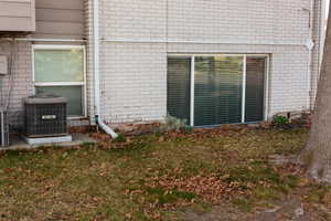 Exterior of condo looking at living room and bedroom windows