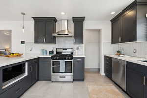 Open kitchen with functional layout and plenty of counter top space.