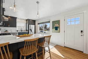 Kitchen area with breakfast bar.